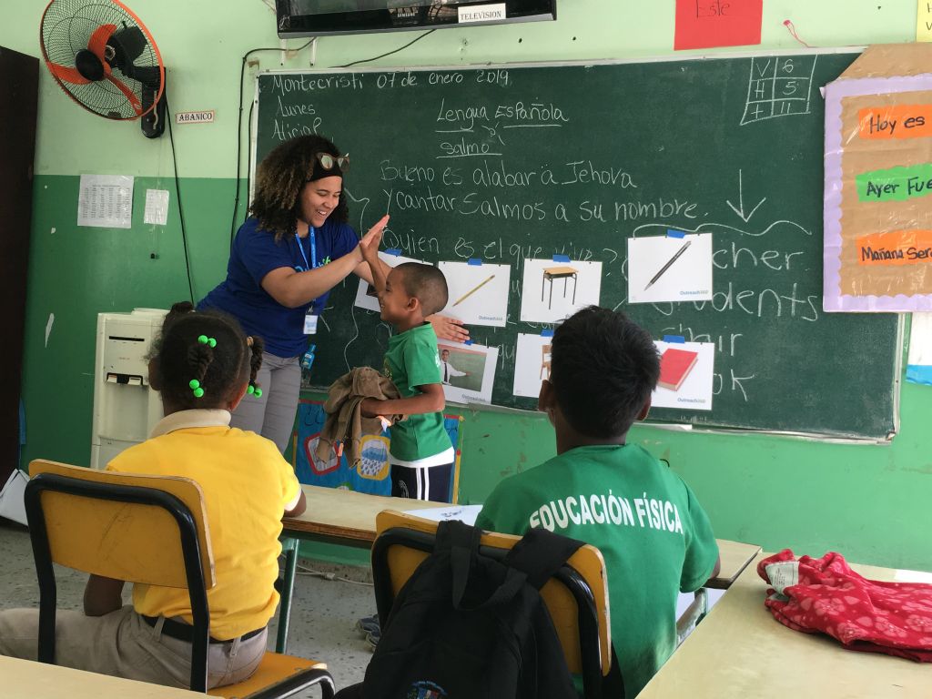 Volunteering at a school in the Dominican Republic during a service-learning trip